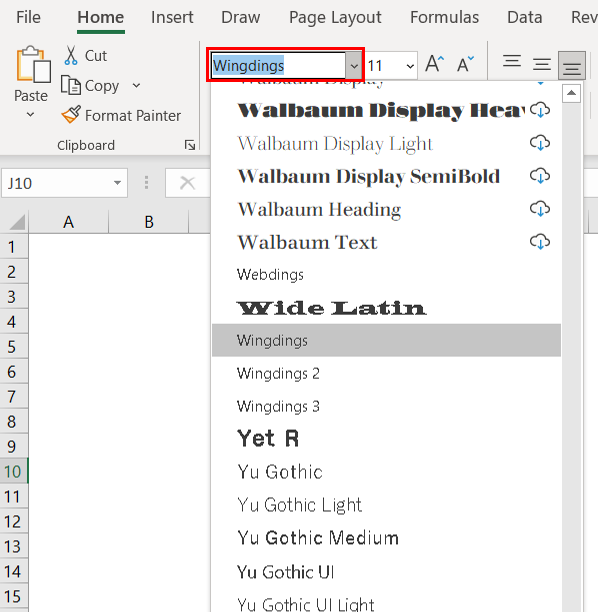 The Wingdings font has been selected  in the Home tab of the Excel ribbon so that a tick symbol in Excel can be inserted in a cell.